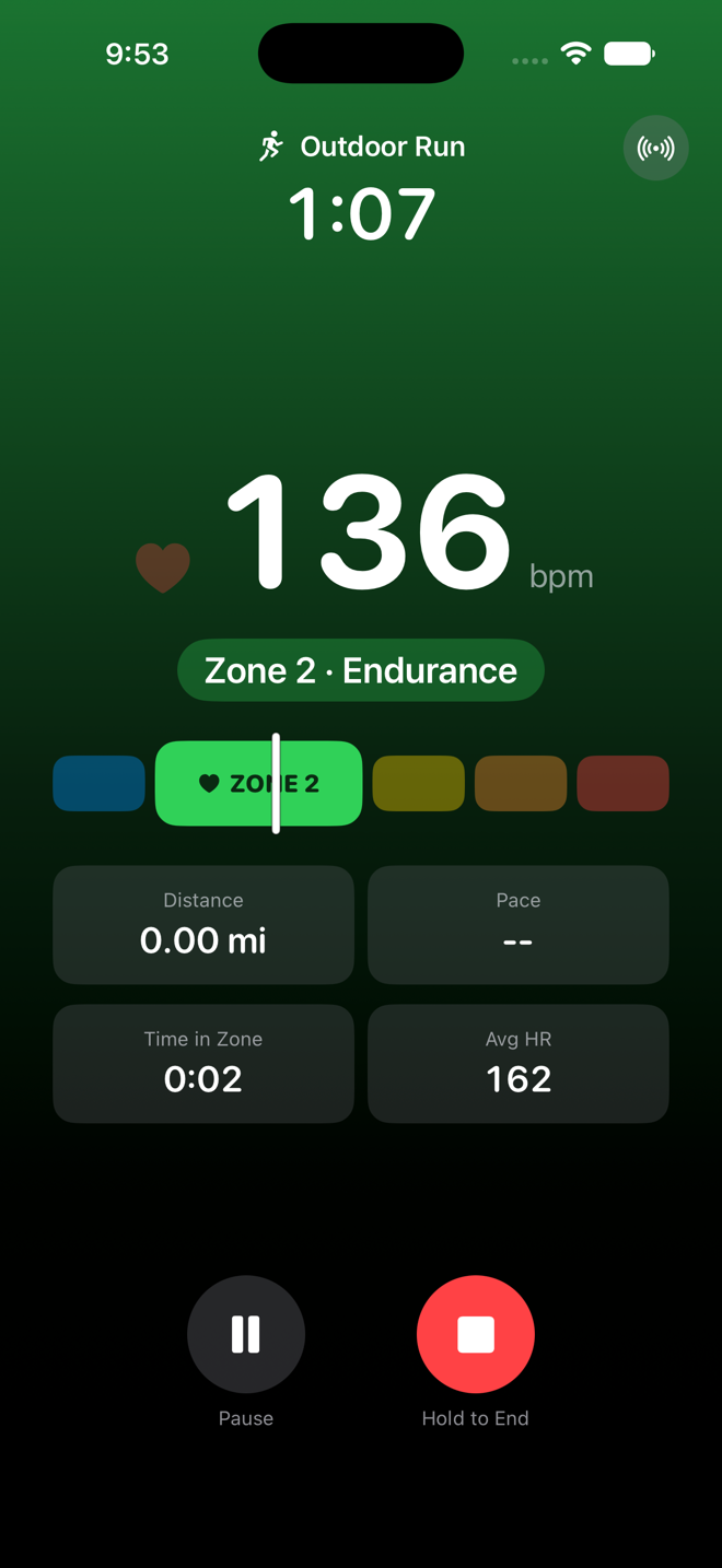 FitZones live workout screen in zone 2: green background, 136 bpm, distance, pace, time in zone and average heart rate